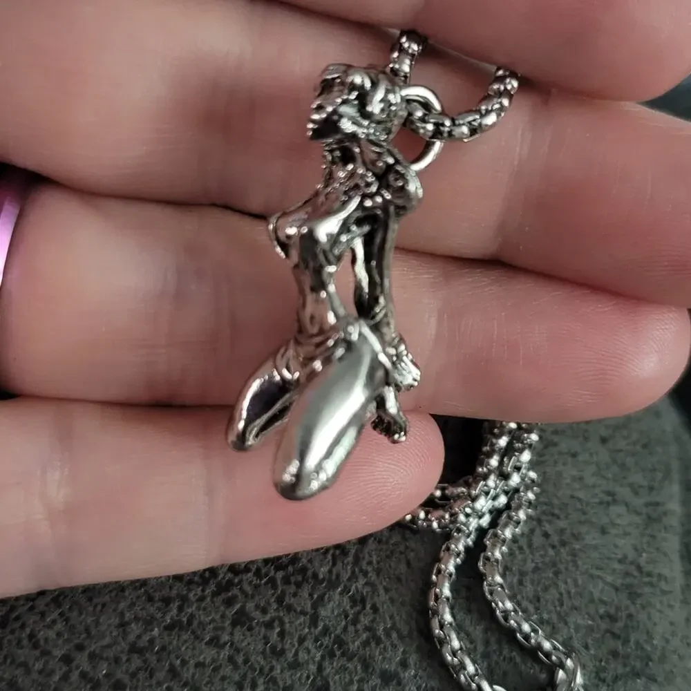 Bound woman kneeling necklace